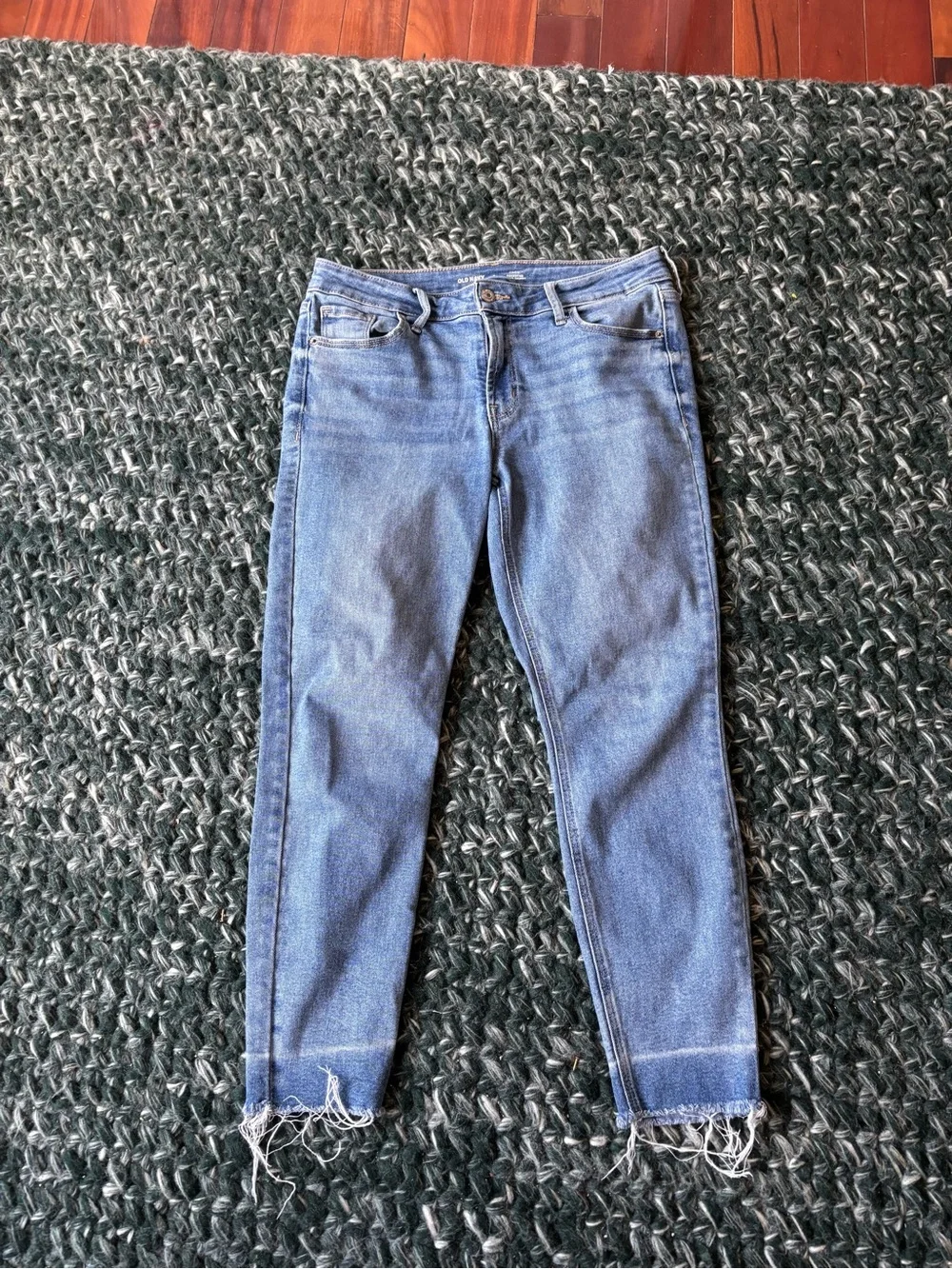 old navy mid rise rockstar super skinny jeans with raw hem